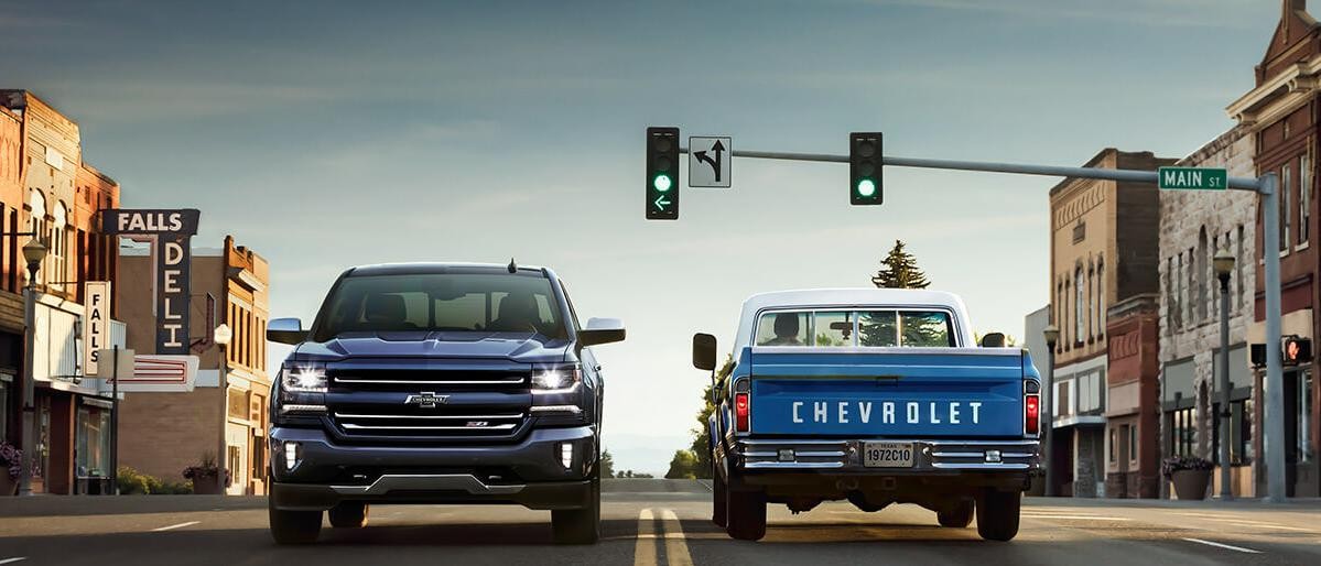 The 2018 Chevy Silverado alongside a 1972 Chevy C10 Truck.