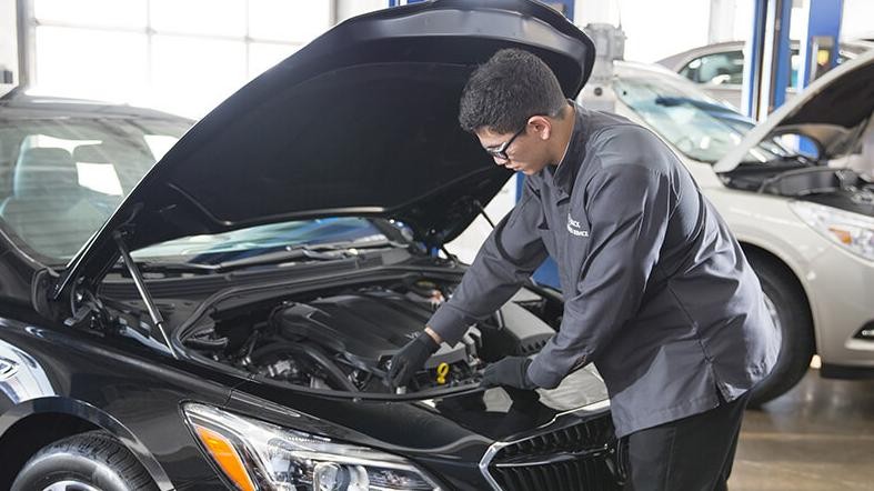 Certified-Service Mechanics in Service Bay