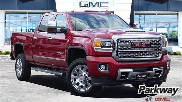 Red denali sierra in front of Parkway Buick GMC dealership